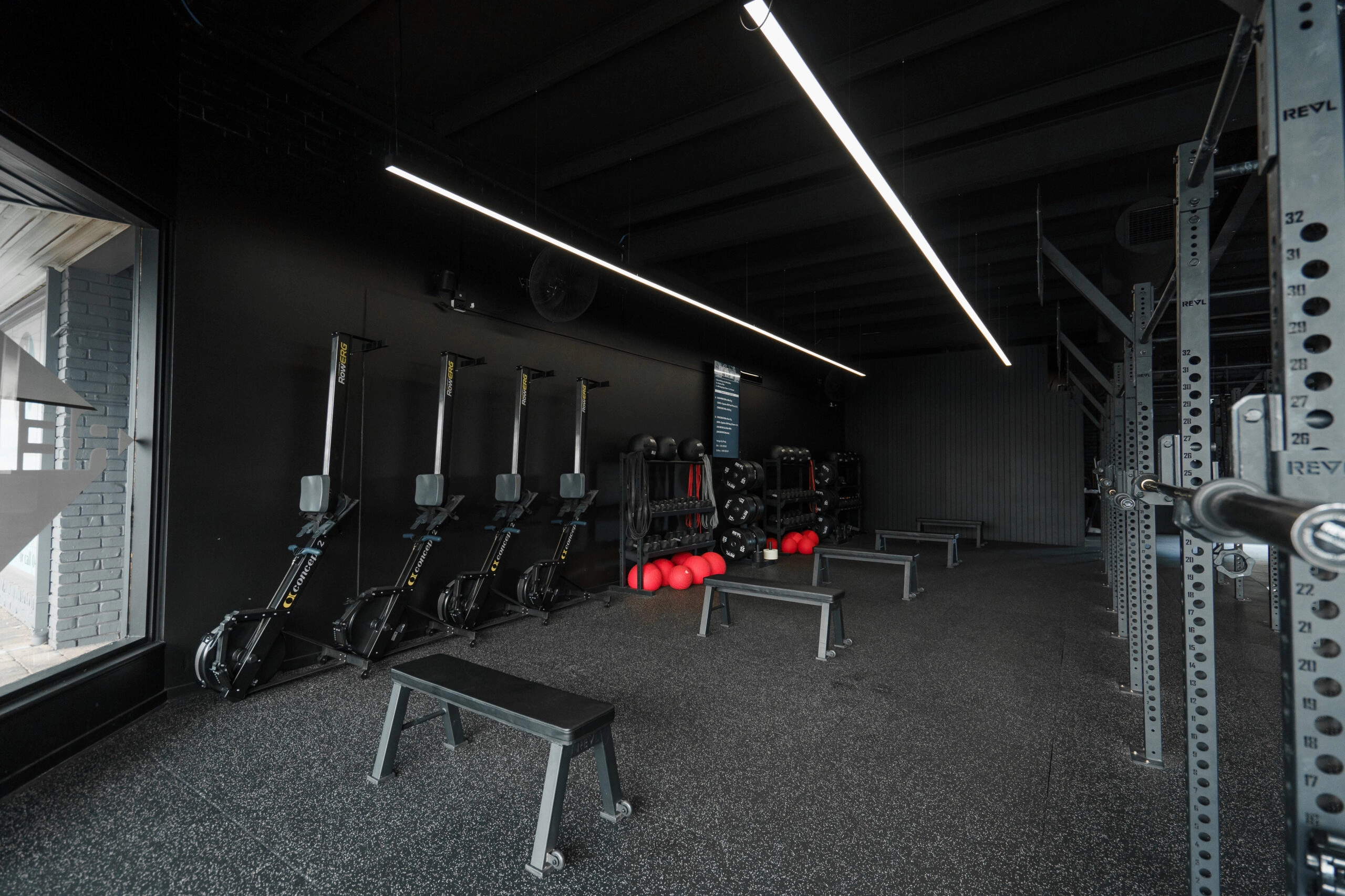 REVL studio fitted out by MasterKraft, with rowers, benches, dumbbells and a rig