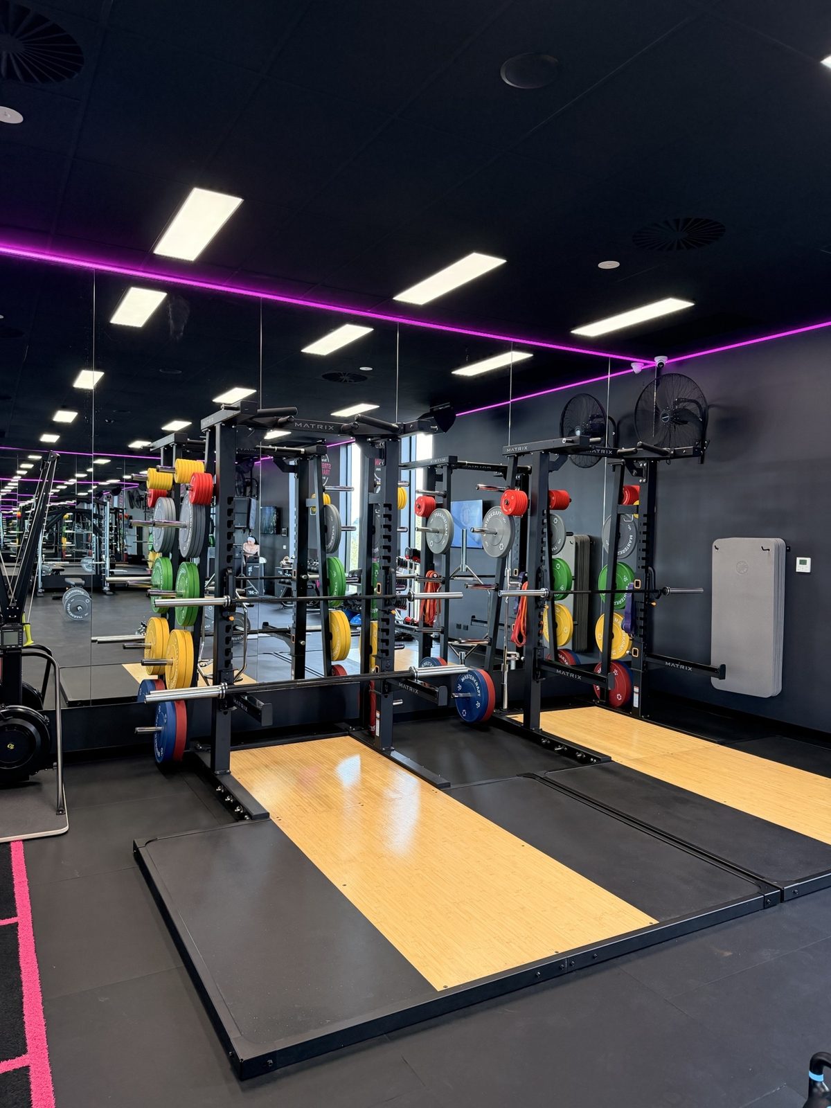 Lifting platforms at Fernwood Pakenham loaded with MasterKraft bumper plates and barbells, Concept2 SkiErg to the left